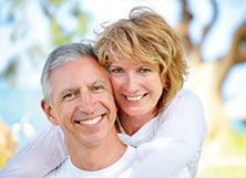 Photo of couple smiling. Link to Life Stage Gift Planner Under Age 60 Situations.