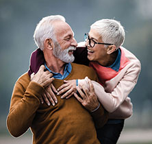 Photo of couple hugging. Links to Tangible Personal Property page.