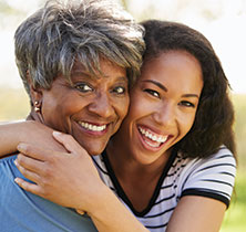 Photo of mother and daughter. Links to Gifts of Life Insurance page.